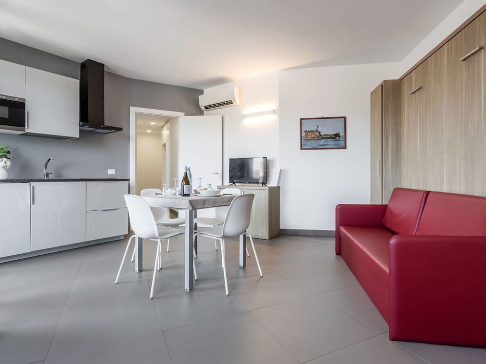 Table, Property, Furniture, Couch, Cabinetry, Building, Countertop, Interior Design, Lighting, Comfort