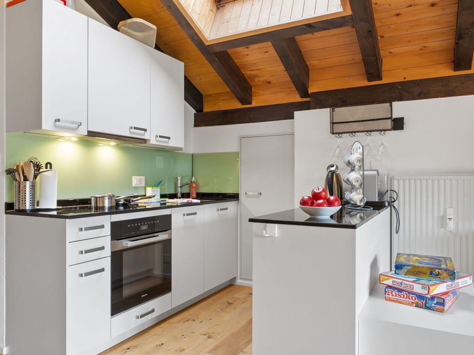 Cabinetry, Countertop, Kitchen Stove, Kitchen, Wood, Kitchen Appliance, Interior Design, Stove, Flooring, Floor