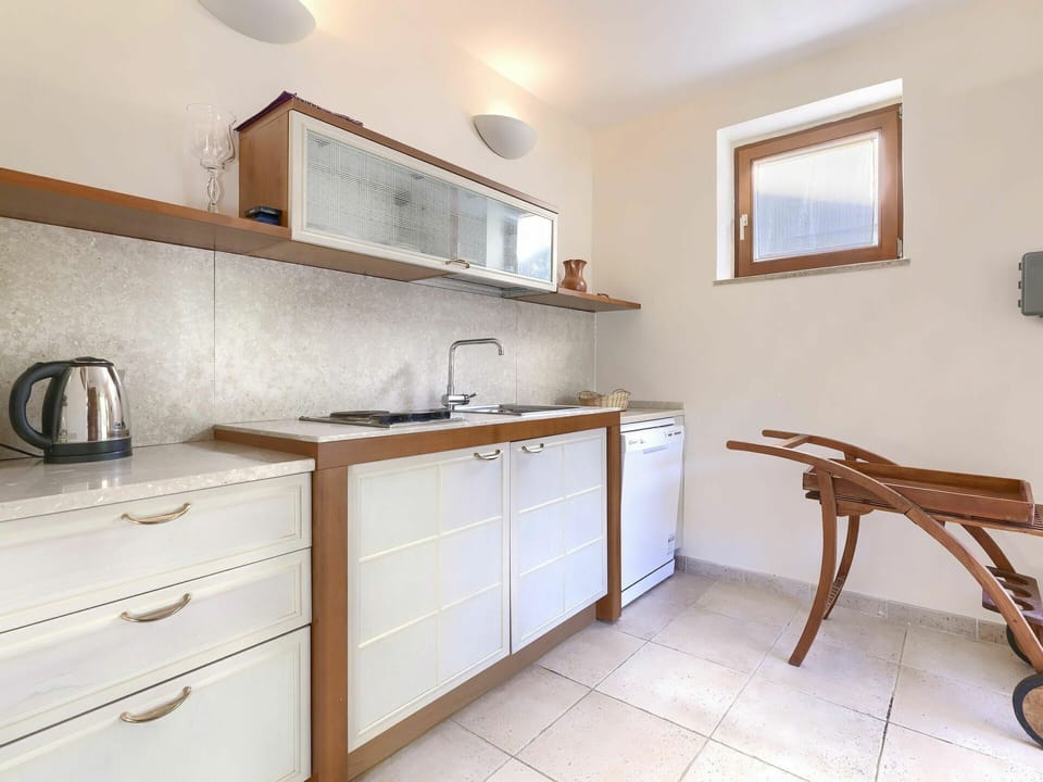 Cabinetry, Countertop, Tap, Sink, Property, Furniture, Bathroom Cabinet, Building, Wood, Plumbing Fixture