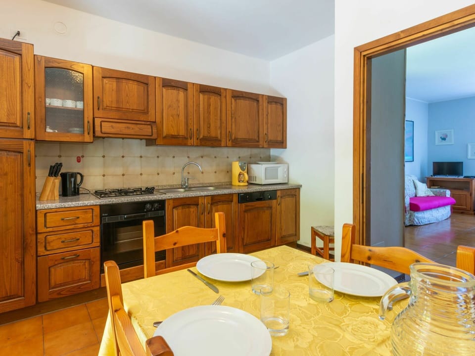 Table, Cabinetry, Property, Furniture, Countertop, Tableware, Chair, Drawer, Kitchen, Wood
