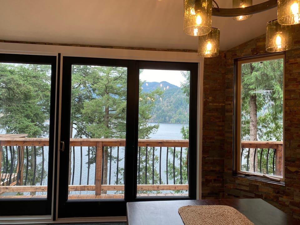 Slider to upper deck w/BBQ, loungers, adirondack chairs, hammock & porch swing