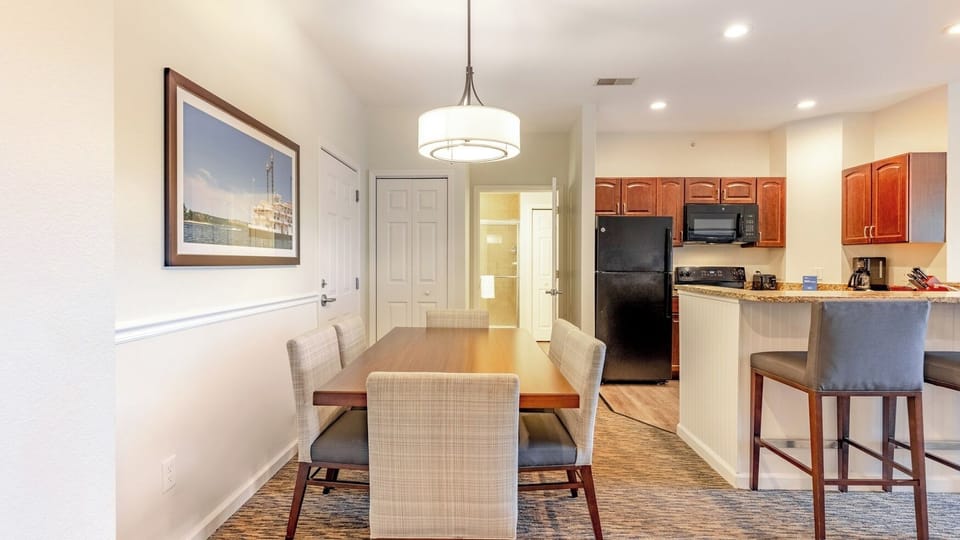 Dining Area • Table & Open Kitchen View