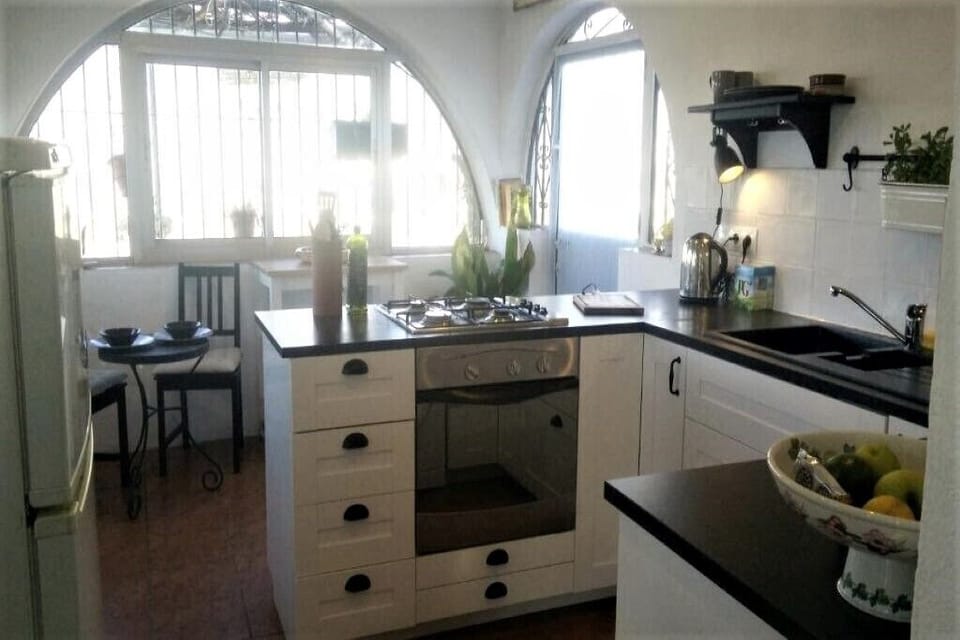 Kitchen with fridge/freezer/washing machine etc