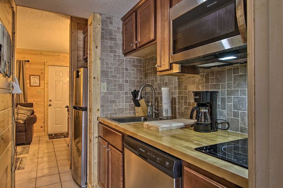 Kitchen area with Stainless Steel appliances