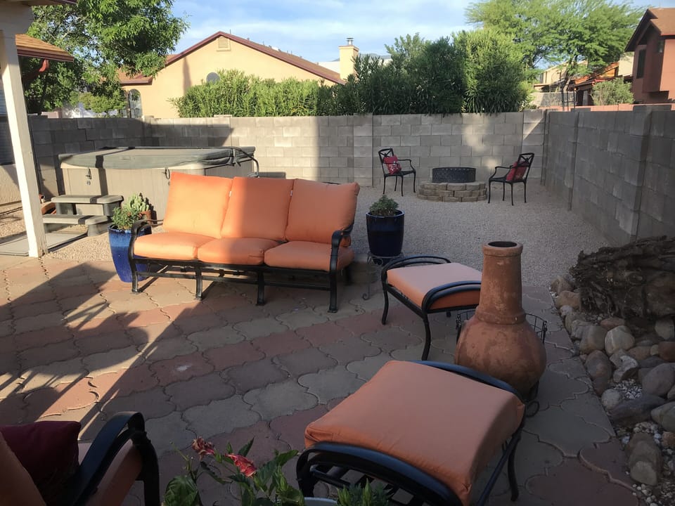 Backyard sitting area with Chiminea.