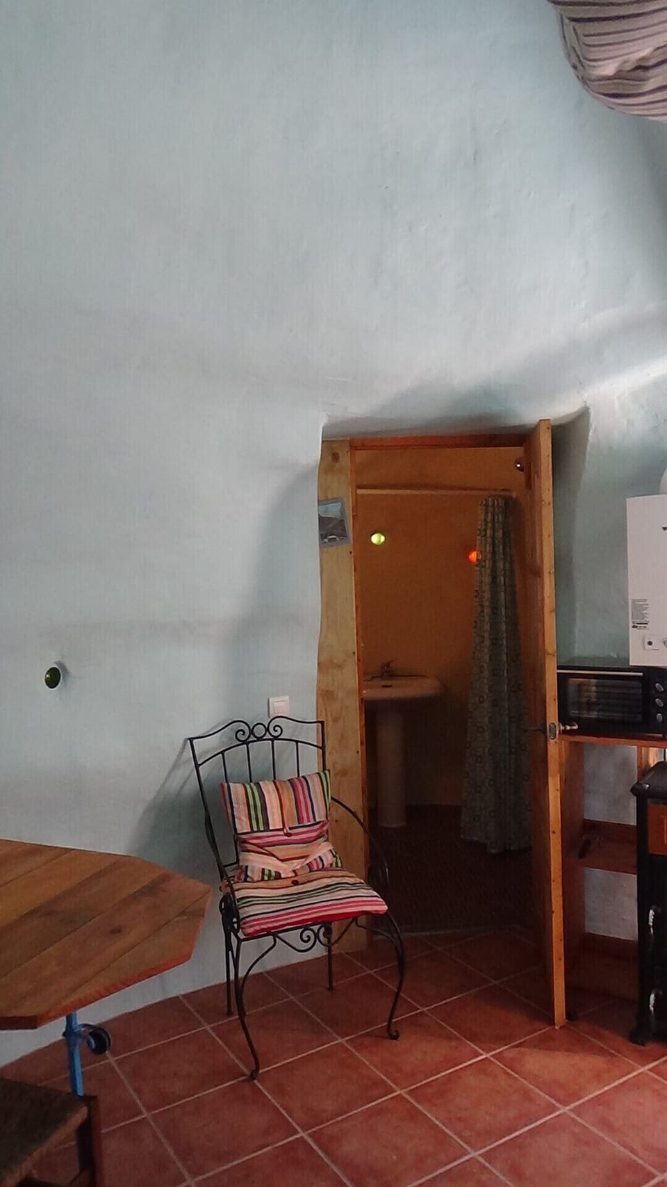 Your shower room and toilet tucked away.