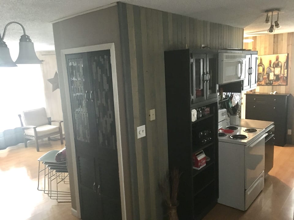 LG. pantry & shelves for storage. | NOTE: No iron or iron board provided. 