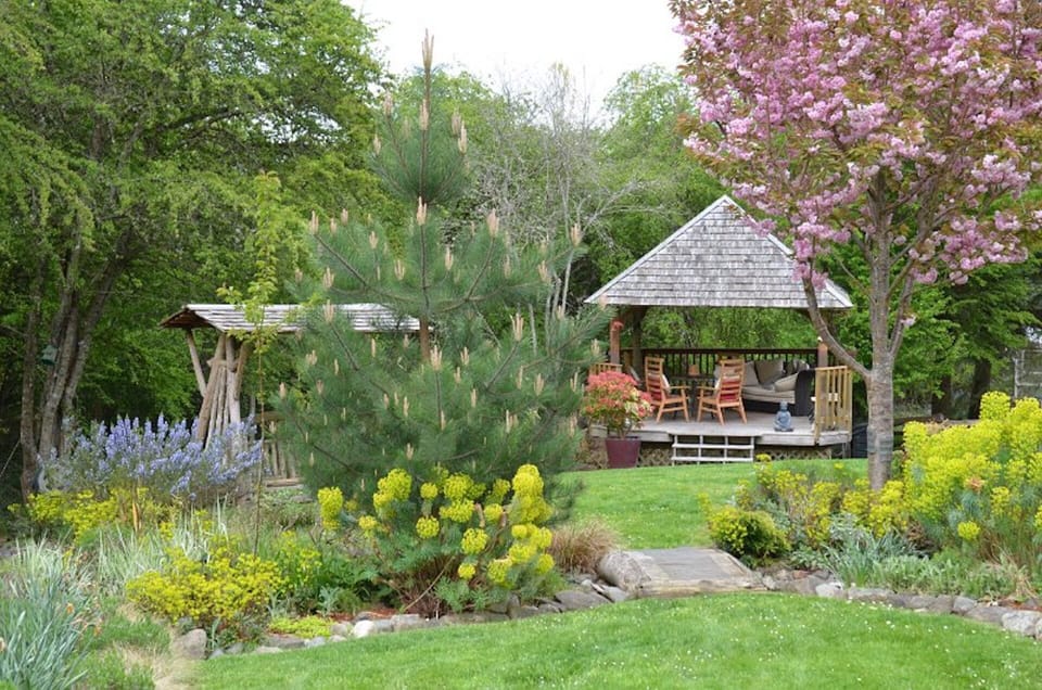 Relax in the garden gazebo, a great spot to enjoy the evening sun