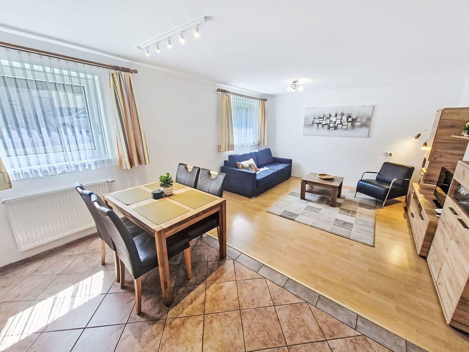 Furniture, Flooring, Interior Design, Couch, Floor, Living Room, Room, Table, Wood Flooring
