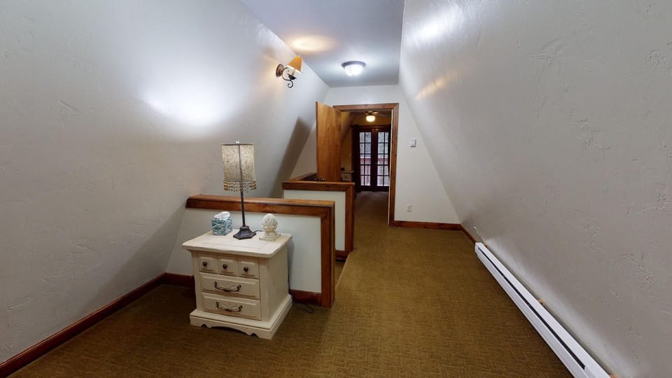 The loft area above the stairs.