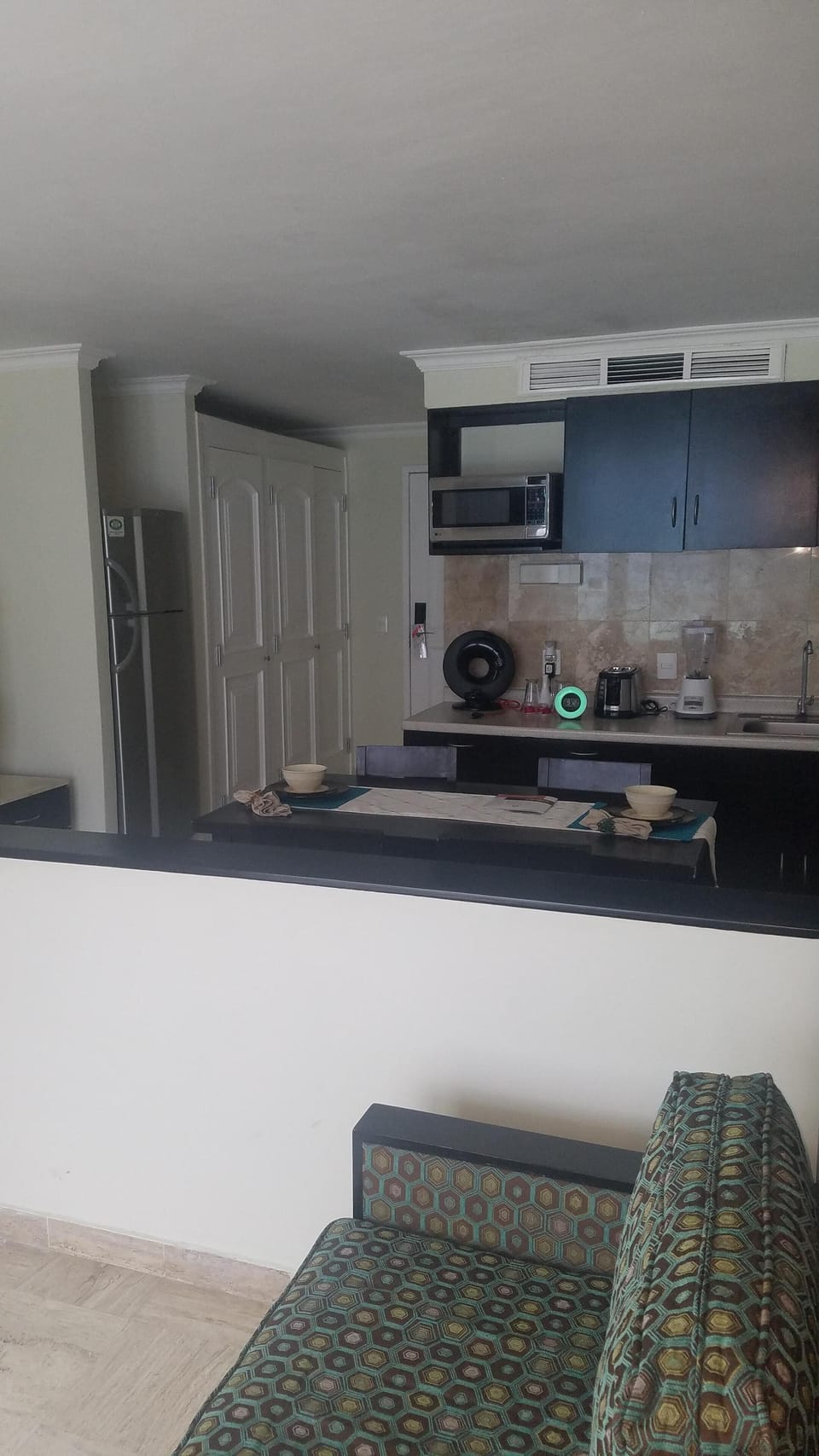 couch and pull down bed if need in kitchenette room