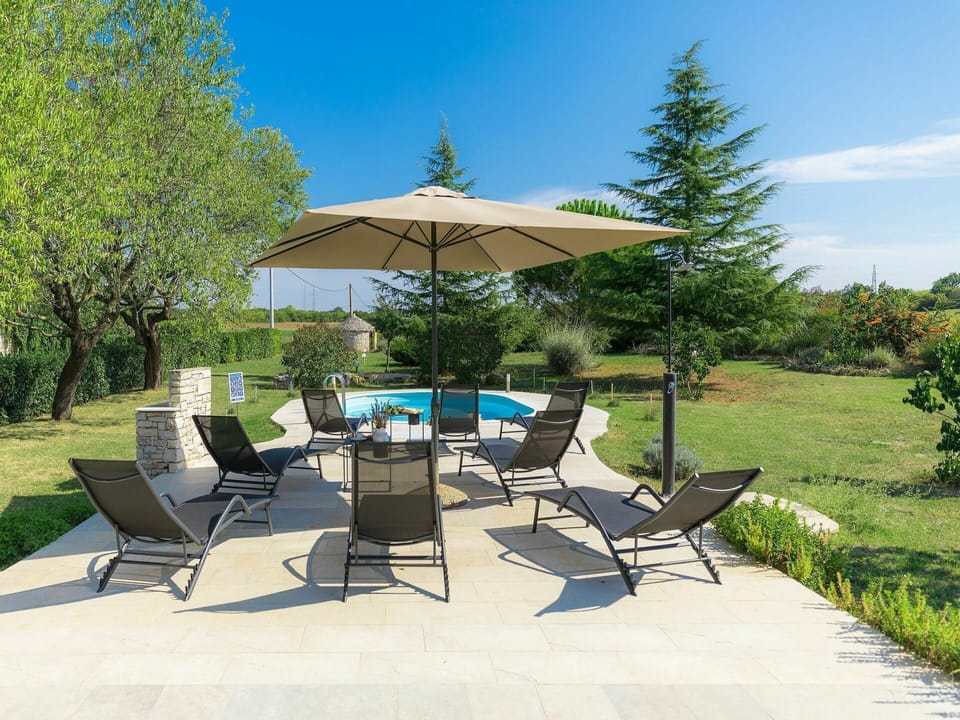 Plant, Sky, Property, Building, Shade, Umbrella, Outdoor Furniture, Chair, Outdoor Table, Tree