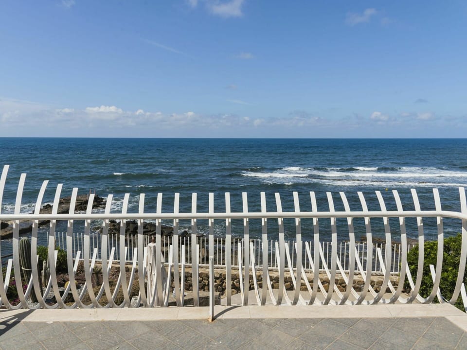 Sky, Water, Cloud, Fence, Coastal And Oceanic Landforms, Wood, Beach, Horizon, Wind Wave, Gas