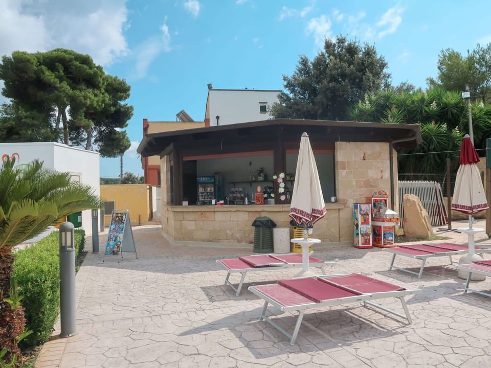 Cloud, Plant, Sky, Building, Window, Tree, Shade, Outdoor Furniture, Table, House