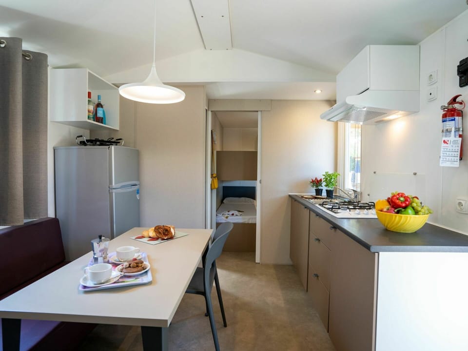 Table, Furniture, Cabinetry, Chair, Building, Kitchen Appliance, Home Appliance, Kitchen, Refrigerator, Lighting