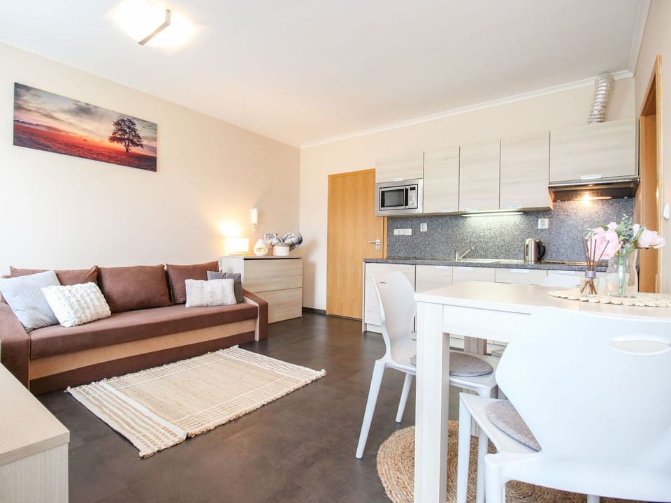 Furniture, Table, Cabinetry, Wood, Comfort, Architecture, Picture Frame, Countertop, Flooring, Building