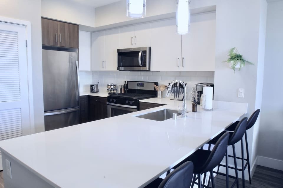 Large stone kitchen bar and countertopsOven, Stove, Microwave, Dishwasher, Refrigerator, Freezer, Washer/Drier, Toaster, Spices, Keurig Coffee Maker, Blender, Rice Maker, Pots, Pans, Silverware, Stemware, Glasses, etc.