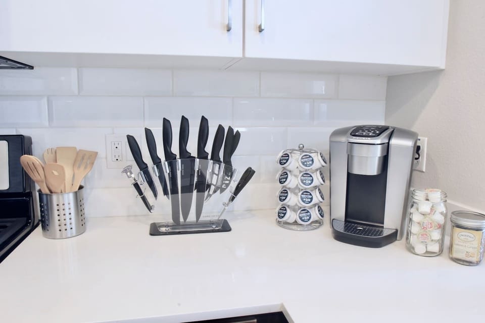 Large stone kitchen bar and countertopsOven, Stove, Microwave, Dishwasher, Refrigerator, Freezer, Washer/Drier, Toaster, Spices, Keurig Coffee Maker, Blender, Rice Maker, Pots, Pans, Silverware, Stemware, Glasses, etc.