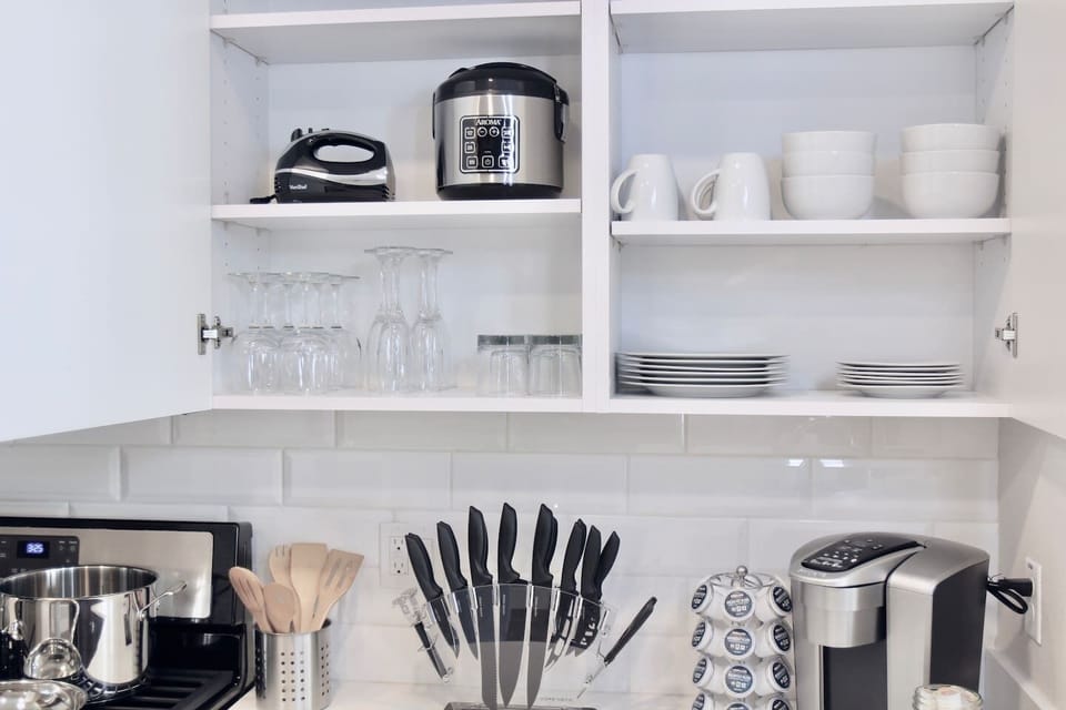 Large stone kitchen bar and countertopsOven, Stove, Microwave, Dishwasher, Refrigerator, Freezer, Washer/Drier, Toaster, Spices, Keurig Coffee Maker, Blender, Rice Maker, Pots, Pans, Silverware, Stemware, Glasses, etc.