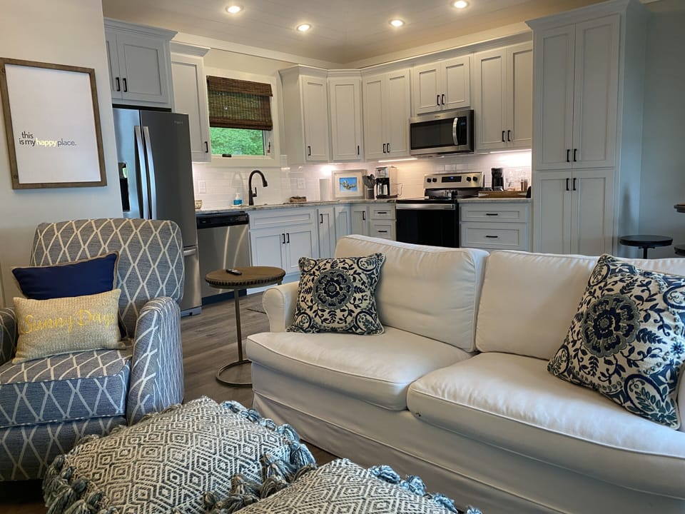 Upstairs living room and full kitchen 