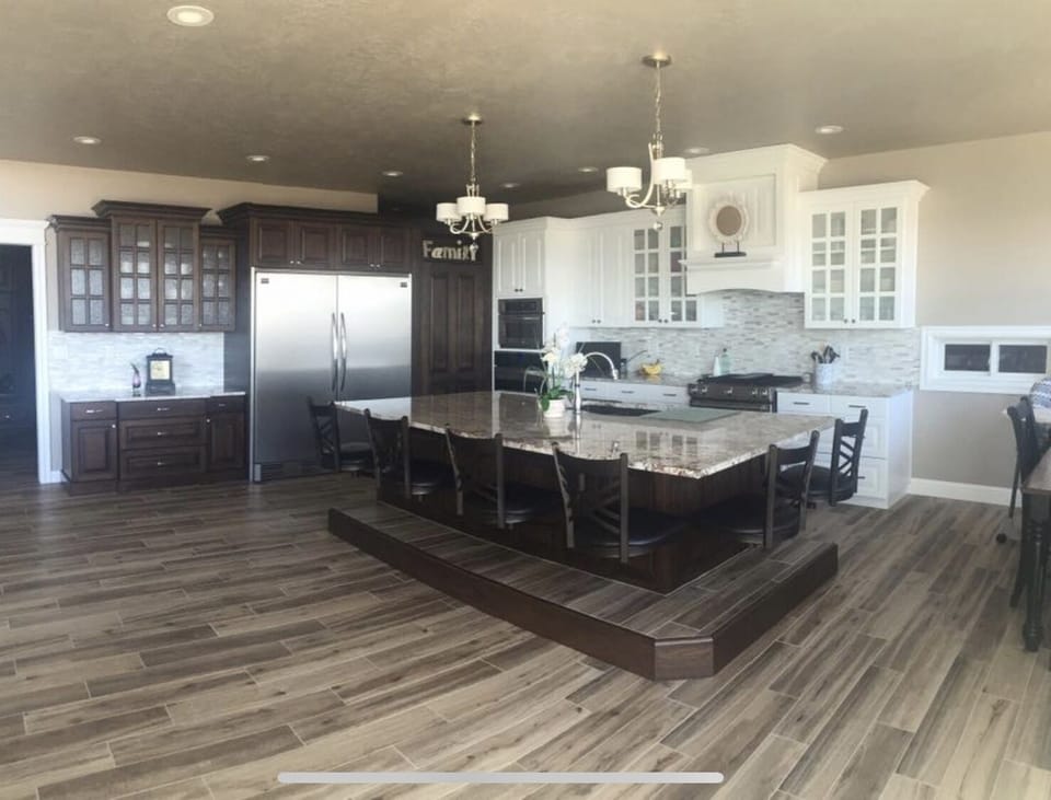 Large Kitchen with oversized fridge and freezer. 