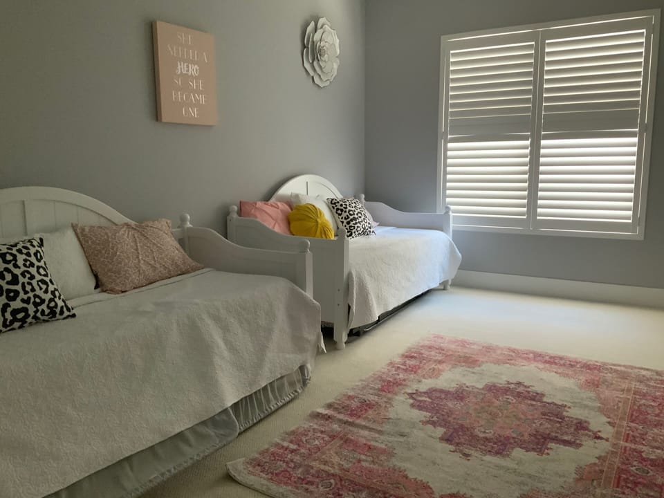 Bedroom 3, Twins/trundle underneath (4 beds). Ensuite restroom, walk in closet. 