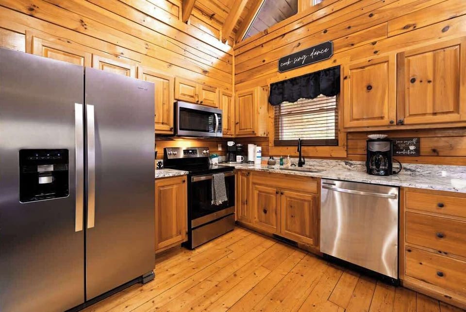 Cooking made enjoyable with this fully stocked open concept kitchen.
