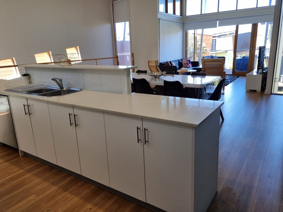 Villa 18 South Shores Resort Normanville - kitchen through to upper balcony