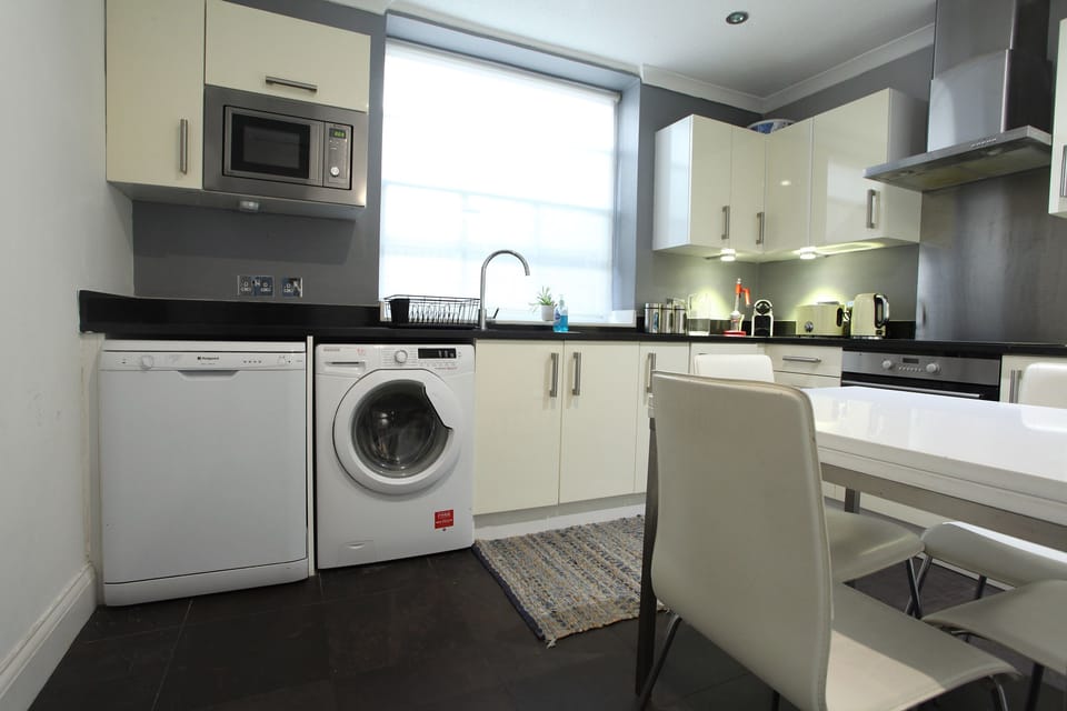 Full kitchen and dining table and chairs
