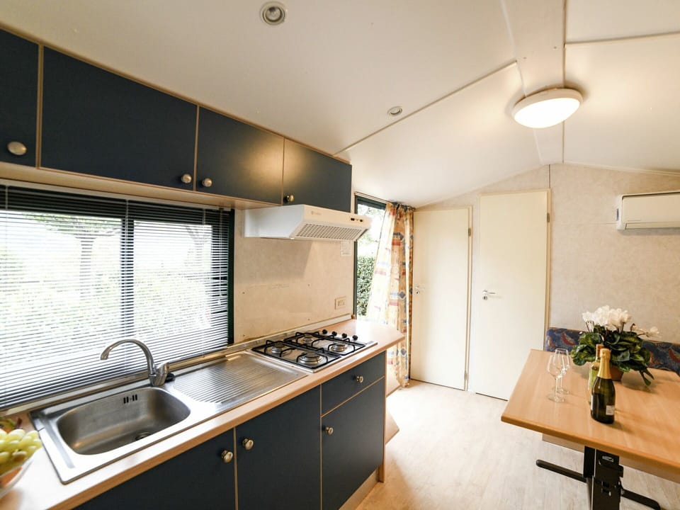 Kitchen Sink, Cabinetry, Sink, Property, Furniture, Countertop, Tap, Lighting, Table, Kitchen Stove