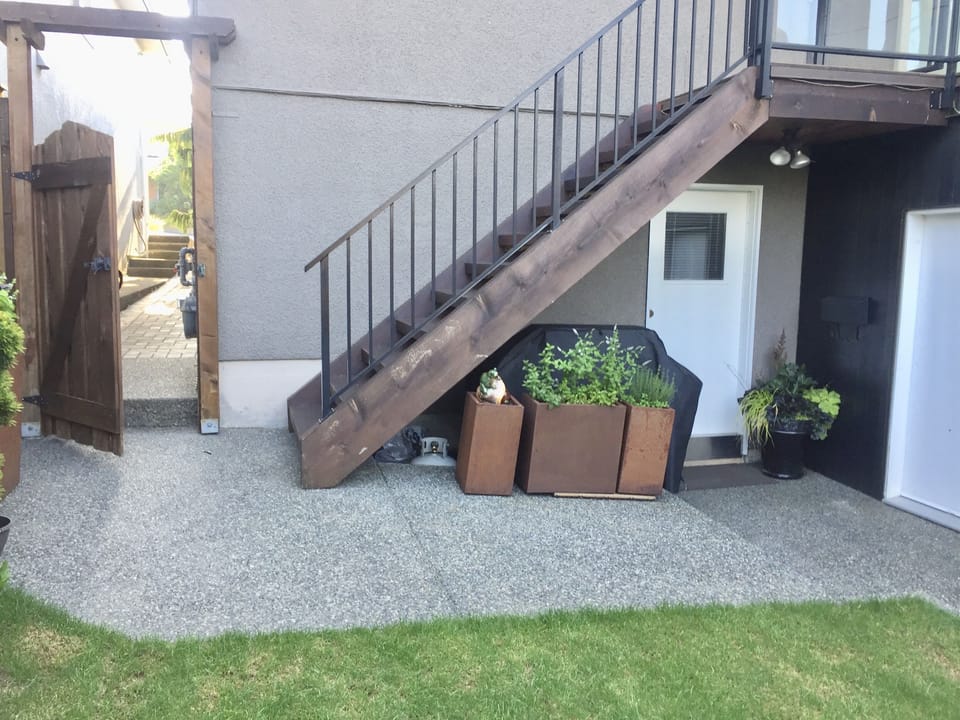 Garden is shared with homeowners, Entrance door to the basement suite.  