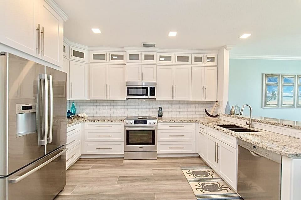 2nd-floor fully stocked gourmet kitchen with stainless steel Bosch appliances