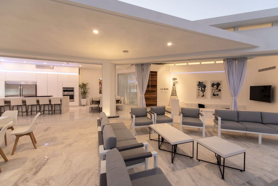Open living area extends to the outdoor terrace