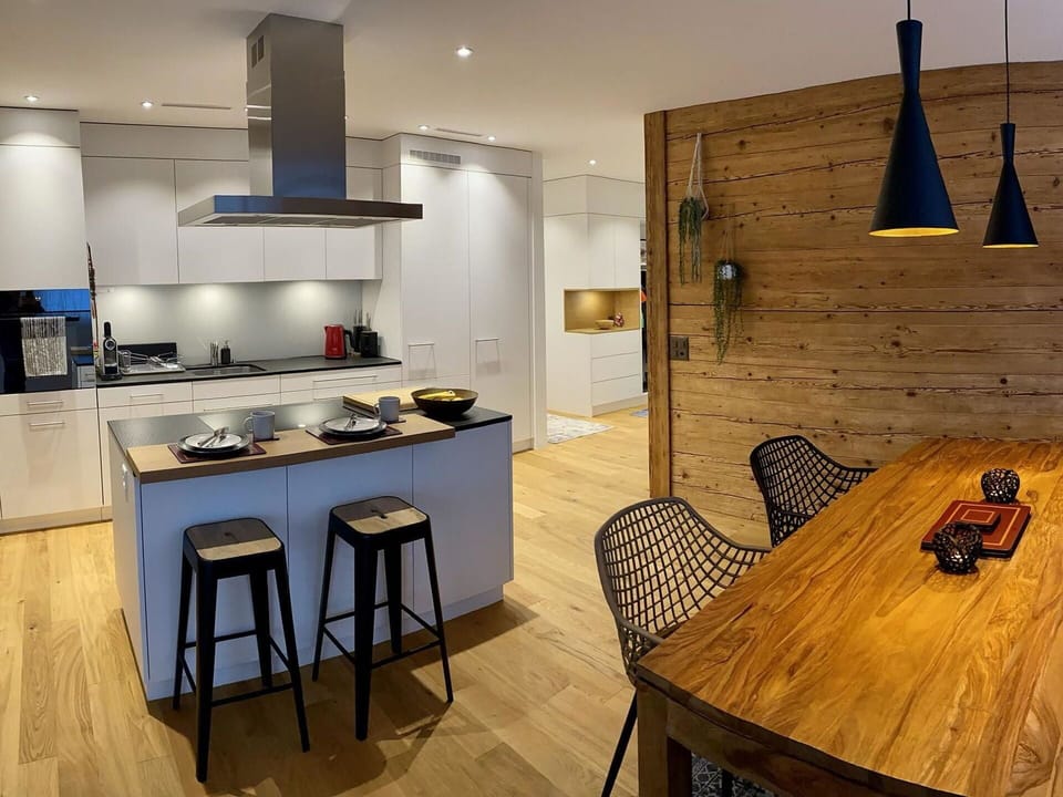 Table, Furniture, Cabinetry, Chair, Wood, Countertop, Lighting, Kitchen Appliance, Interior Design, Home Appliance
