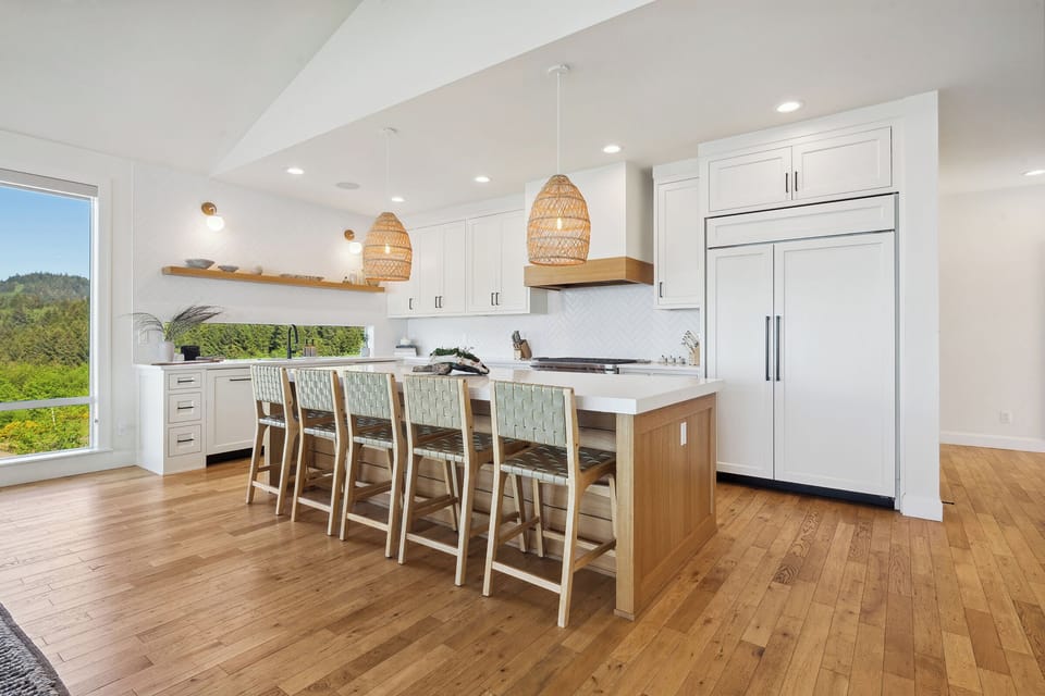 Neskape's gourmet kitchen has a large island with seating for 5