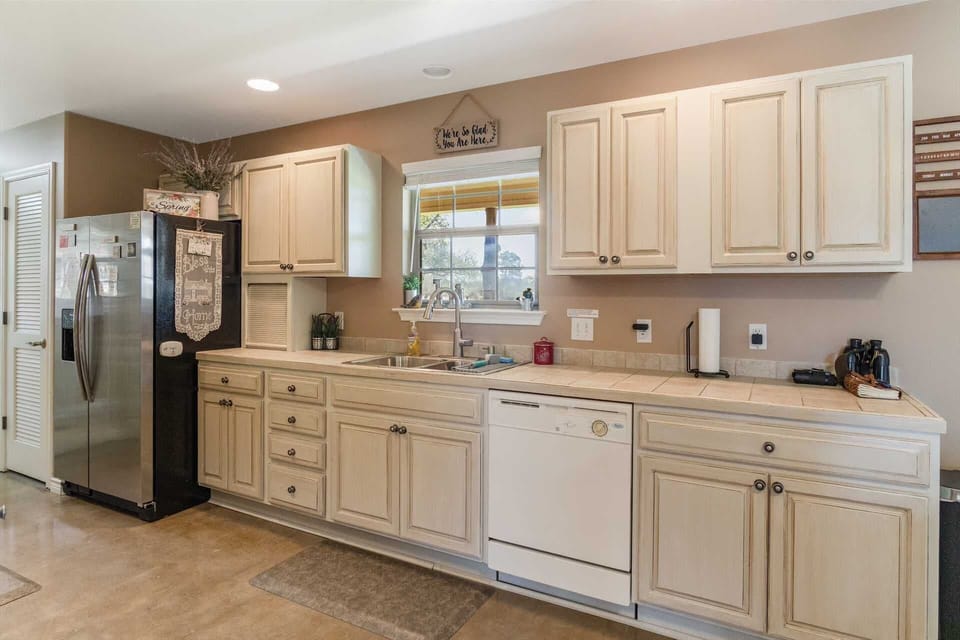 The cupboards are filled with cooking ware, dining ware, utensils and glasses, Omie wouldn't have it any other way!