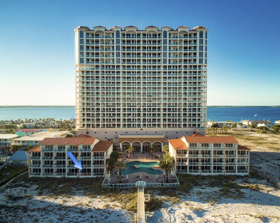 See blue arrow pointing…a short walking distance to the beach.