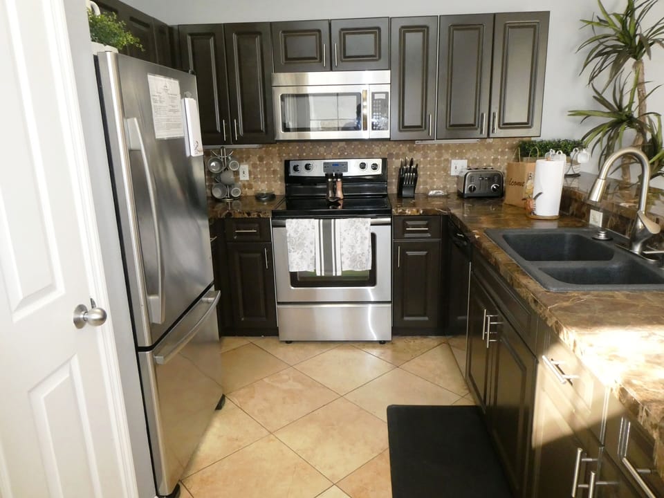 Well equipped kitchen open to the dining area 