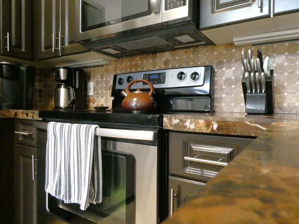 Eqiopped with pans, dishes, utensils & small appliances for home cooking