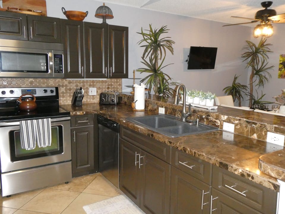 Well equipped kitchen open to the dining area 