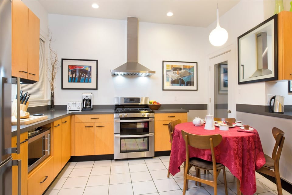 Designer Kitchen - Stone Counter-Tops, Stainless Steel, Quality Wood Cabinets.