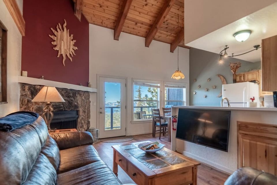 Living Room with Queen pull out couch, TV with streaming.