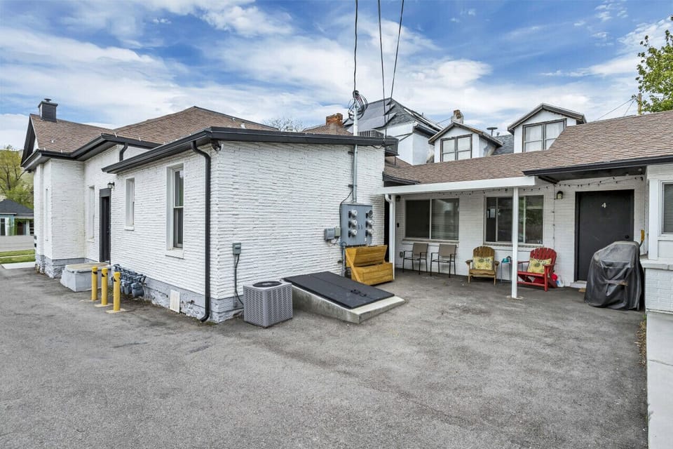 Side Entrance, #3 with patio chairs
