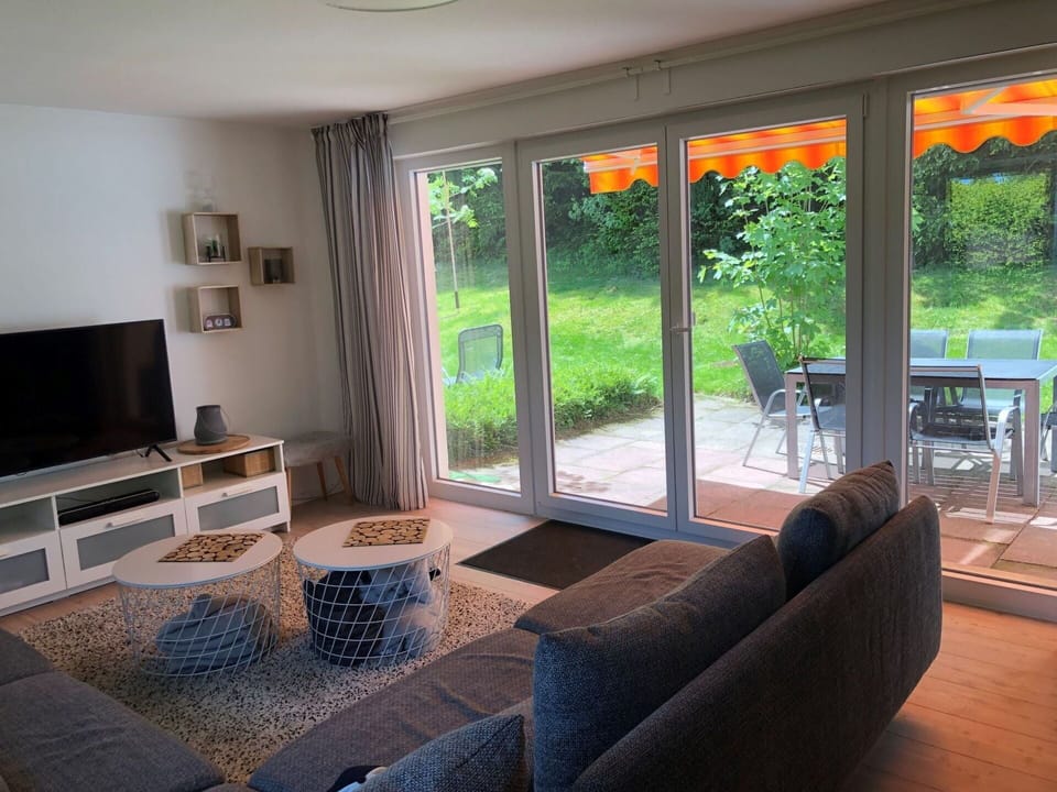 Plant, Furniture, Building, Table, Couch, Shade, Interior Design, Chair, Wood, Floor