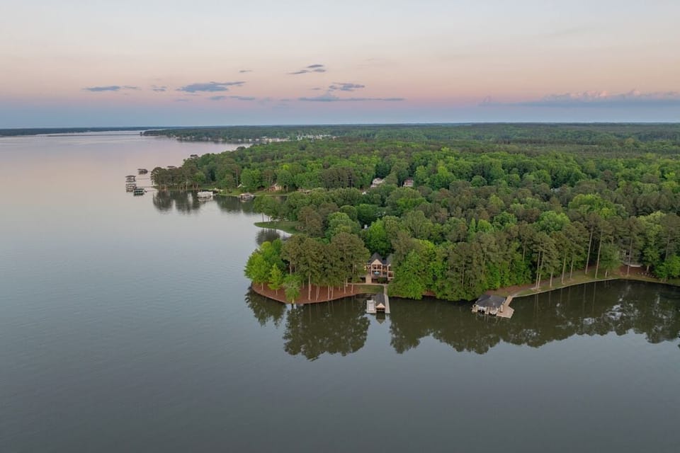 Aerial view showing the house, the main lake and Lysons Creek