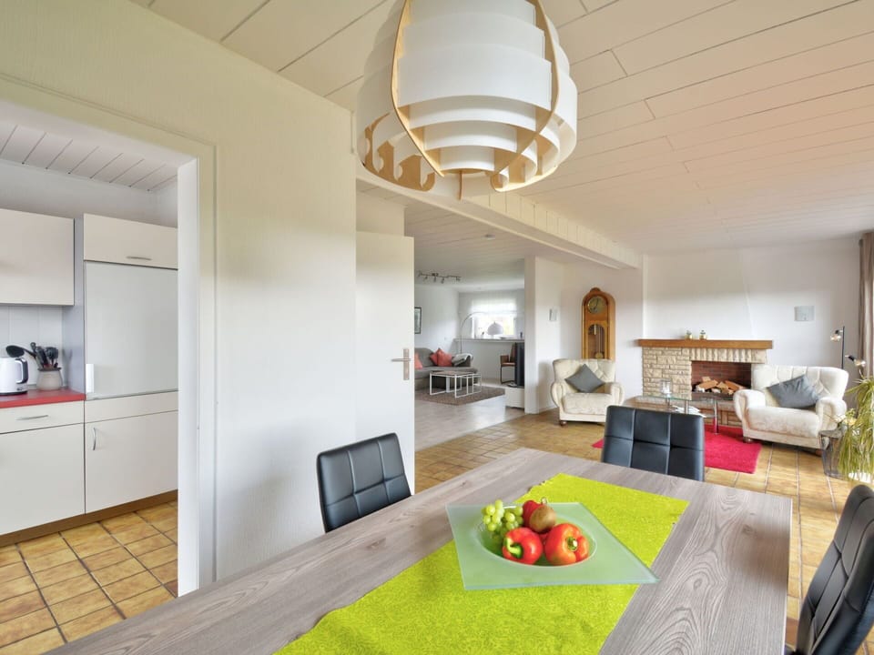 Property, Cabinetry, Couch, Comfort, Interior Design, Wood, Flooring, Living Room, Floor, Houseplant