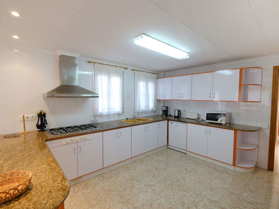 Property, Room, Countertop, Furniture, Kitchen, Cabinetry, Building, Interior Design, Real Estate, Floor
