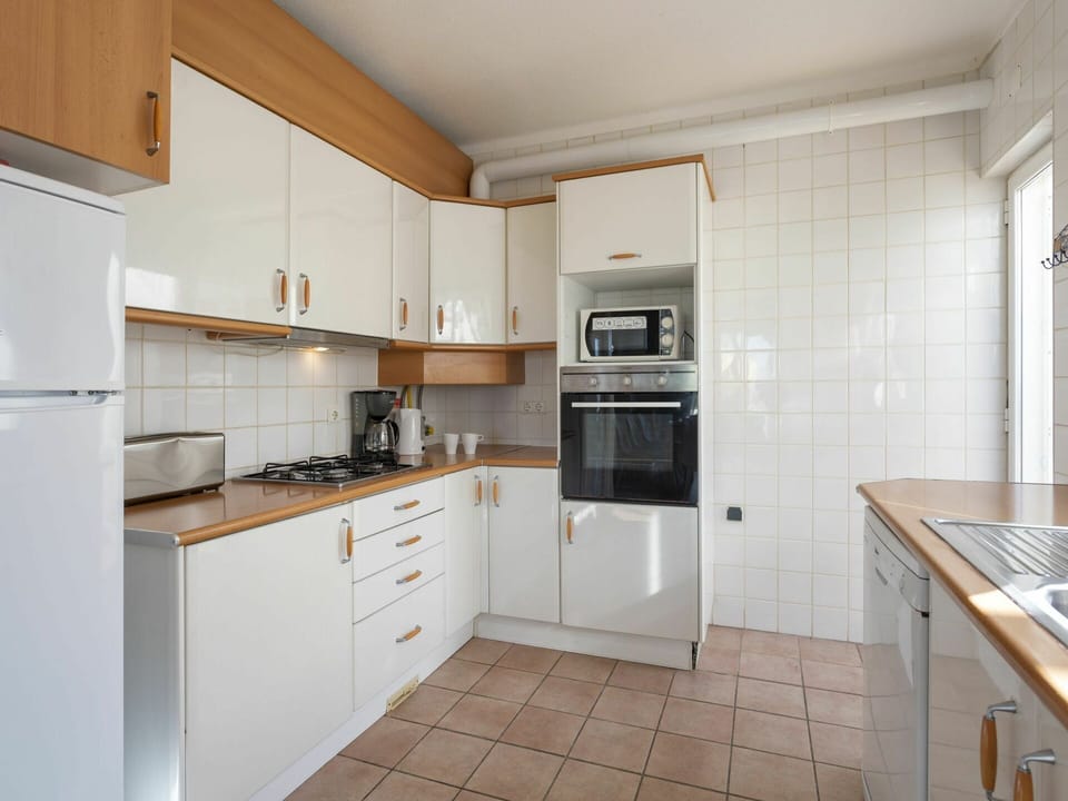 Cabinetry, Countertop, Furniture, Building, Kitchen Appliance, Kitchen Stove, Wood, Interior Design, Drawer, Home Appliance