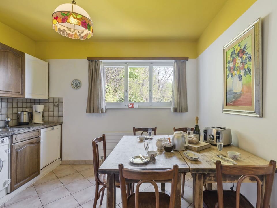 Table, Furniture, Property, Cabinetry, Window, Wood, Interior Design, Picture Frame, Lighting, Yellow