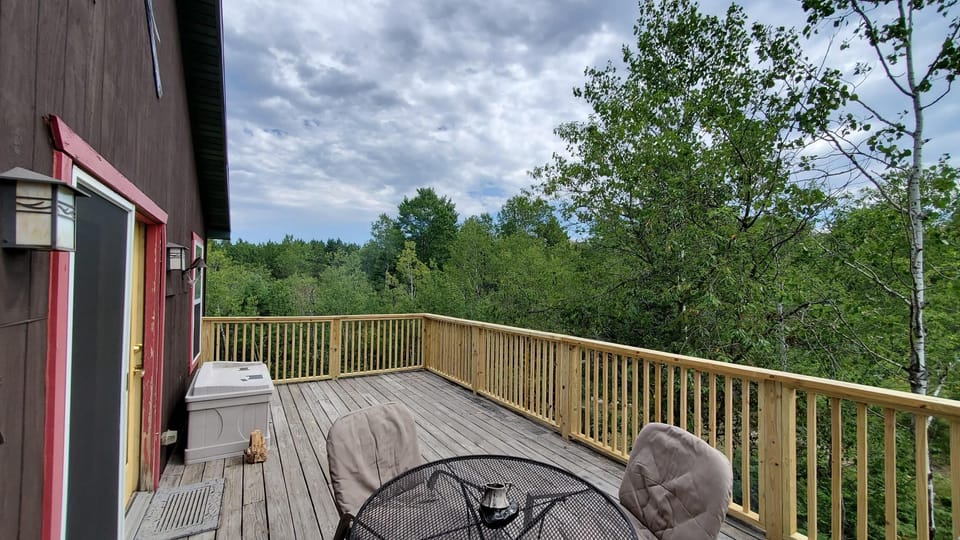 Second story deck facing towards the river and overlooking the state forest